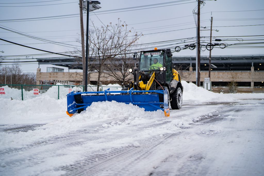 KAGE SnowFire plowing on New Holland Wheel Loader