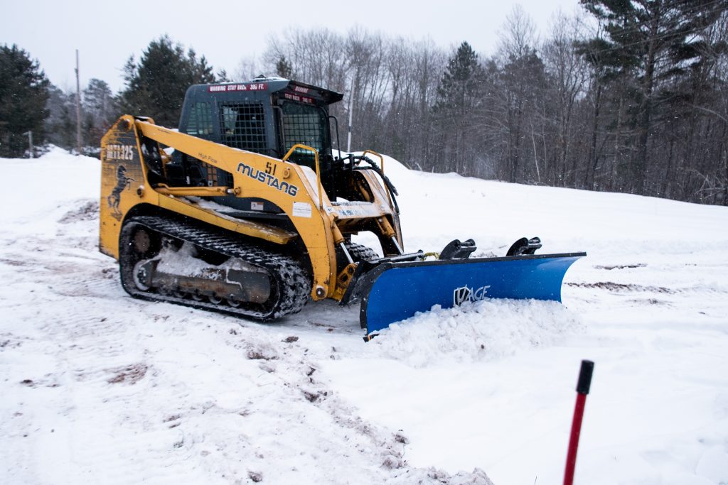 SnowFire Xtreme Skid Steer Snow Blade on Mustang CTL