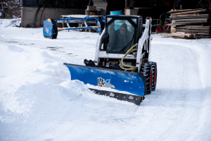 SnowFire Xtreme Skid Steer Snow Plow and Pusher Bobcat