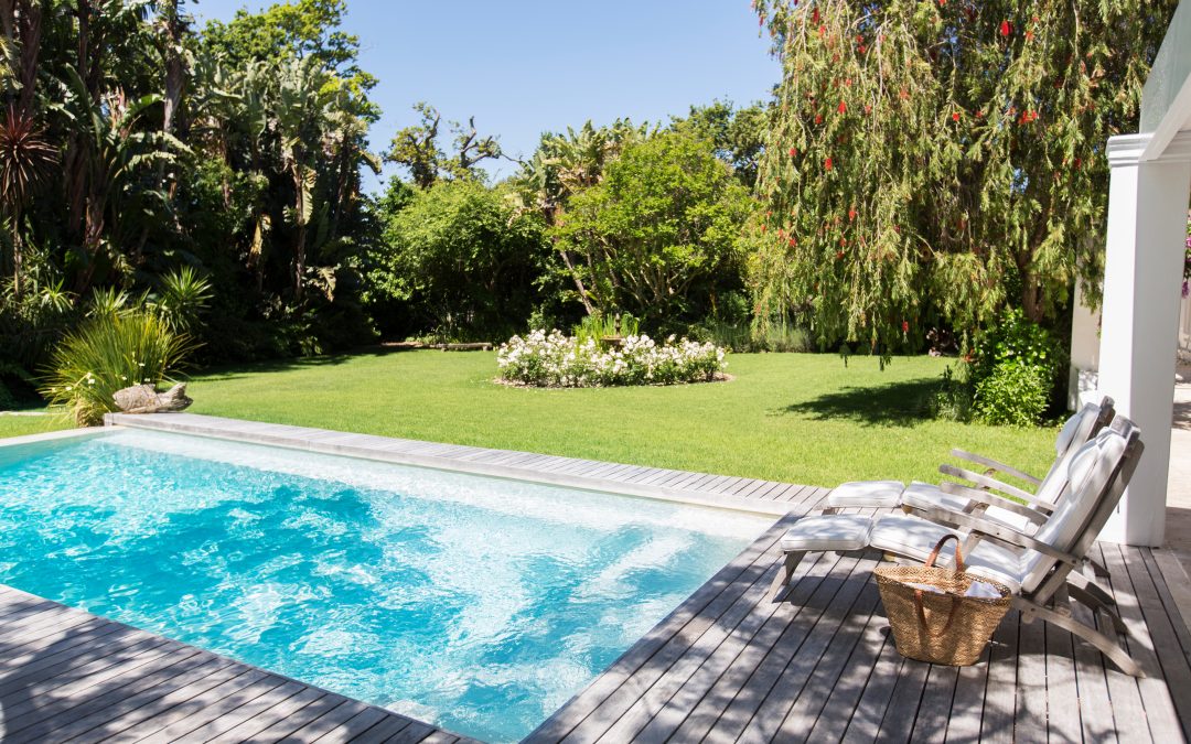 Why Every Lawn Care Professional Should Protect Swimming Pools from Grass Clippings and Flying Debris